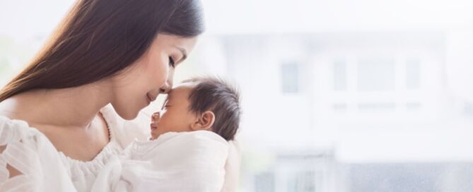 mother holding her baby
